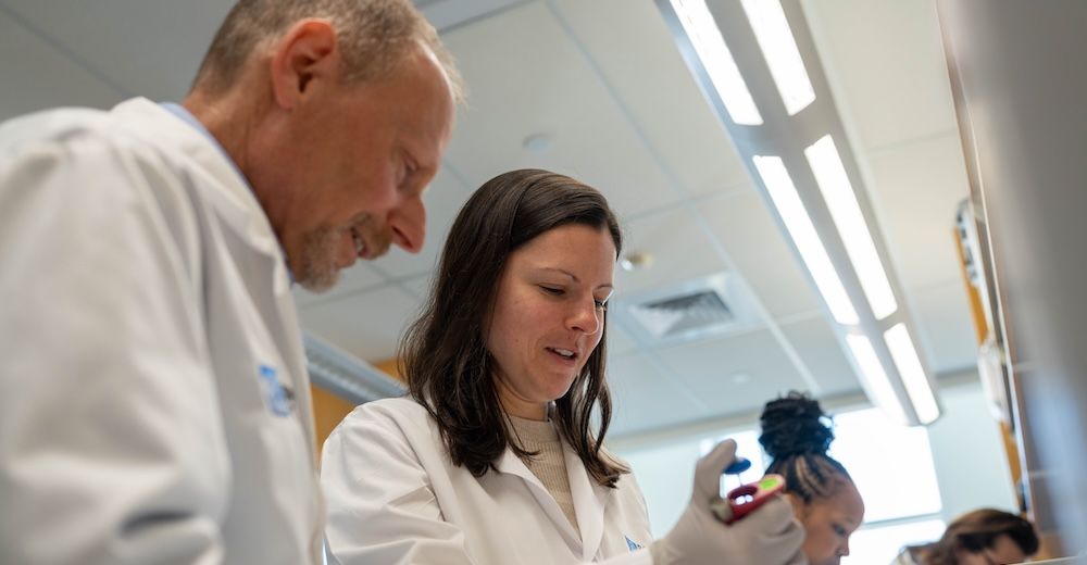 Two scientists working in a lab