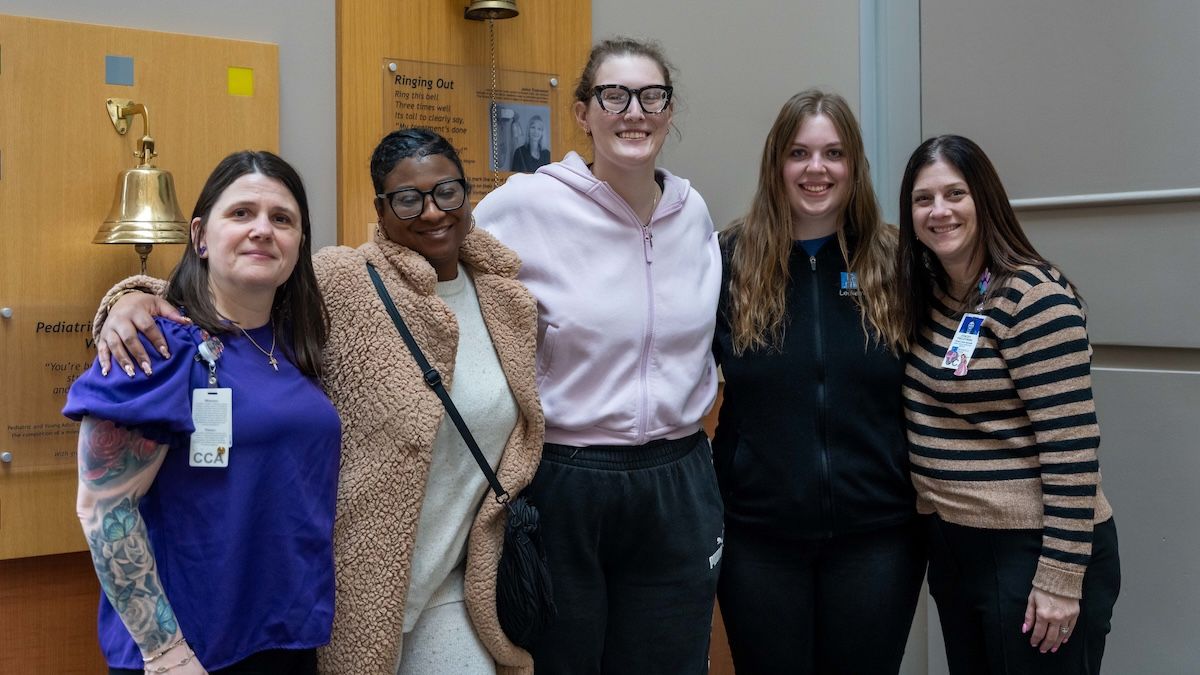 A group of woman smile after celebrating