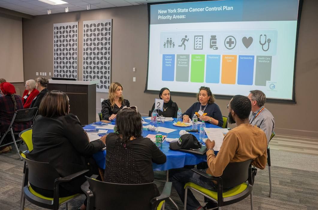 Roswell Park staff and community members discuss cancer-related topics. 