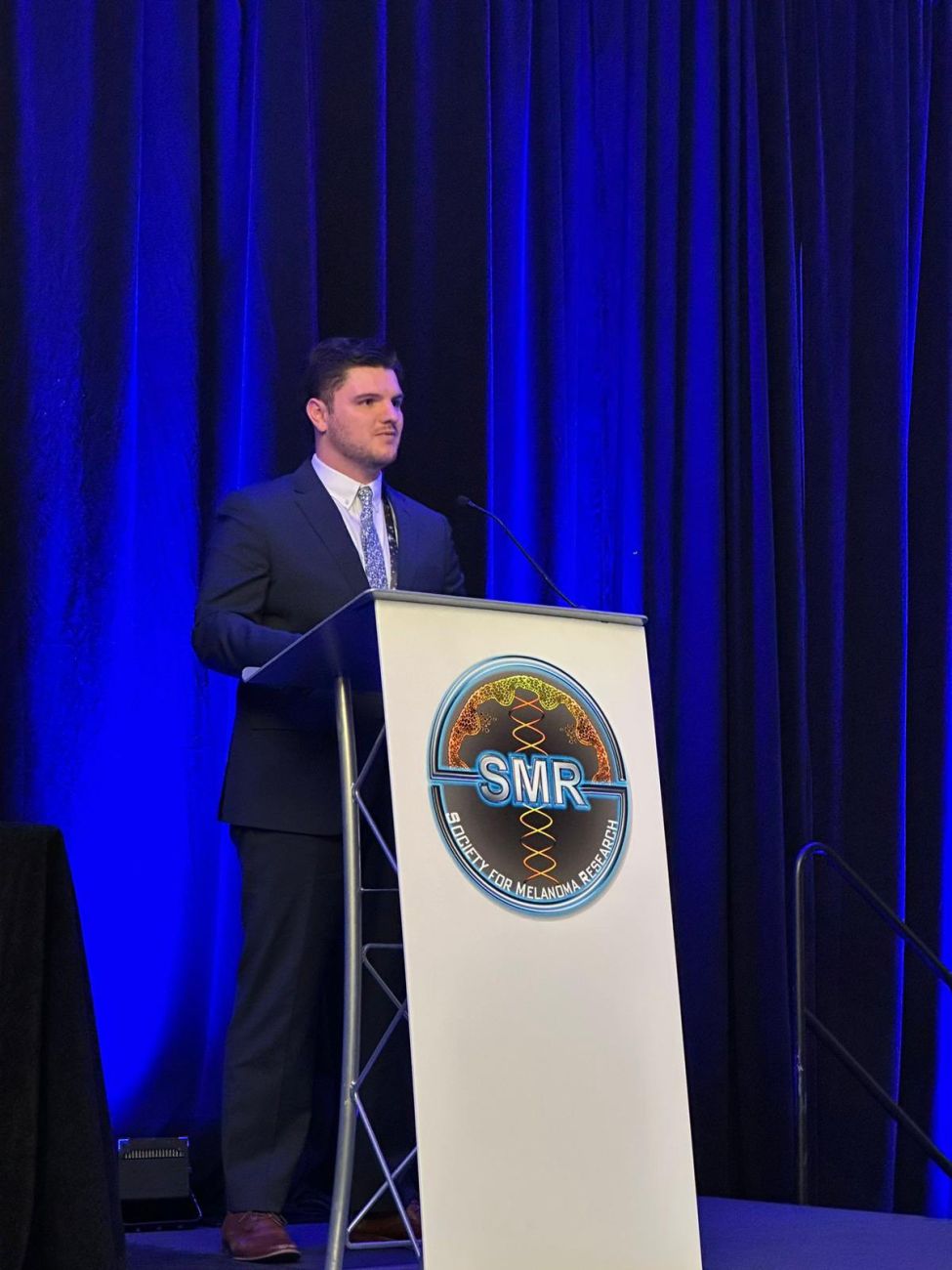Hematology oncology fellow Marcus Dempster presents at Society of Melanoma Research conference 2023