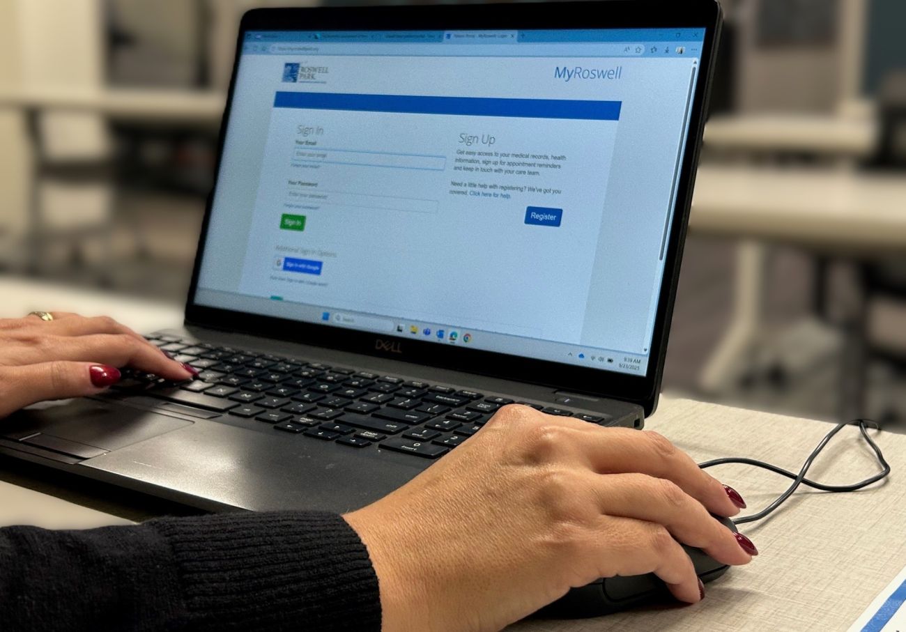 A person navigates the Roswell Park Patient Portal on a computer 