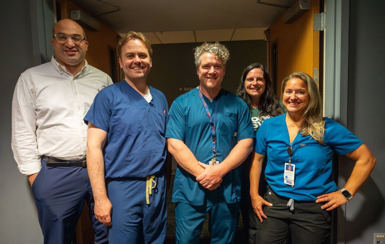 Nurses and doctors await to greet patients