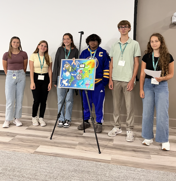 Buffalo Health Exploration Students 2025 group 3 pose around their Storyboard Project
