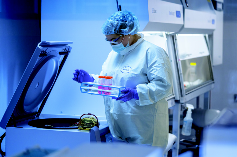 Lab technician working at Roswell Park