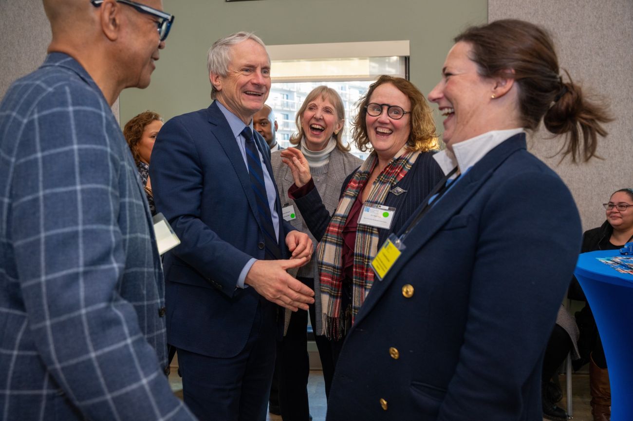Members of Roswell Park's Outreach teams smile with Buffalo Mayor Sean Ryan, second from left.