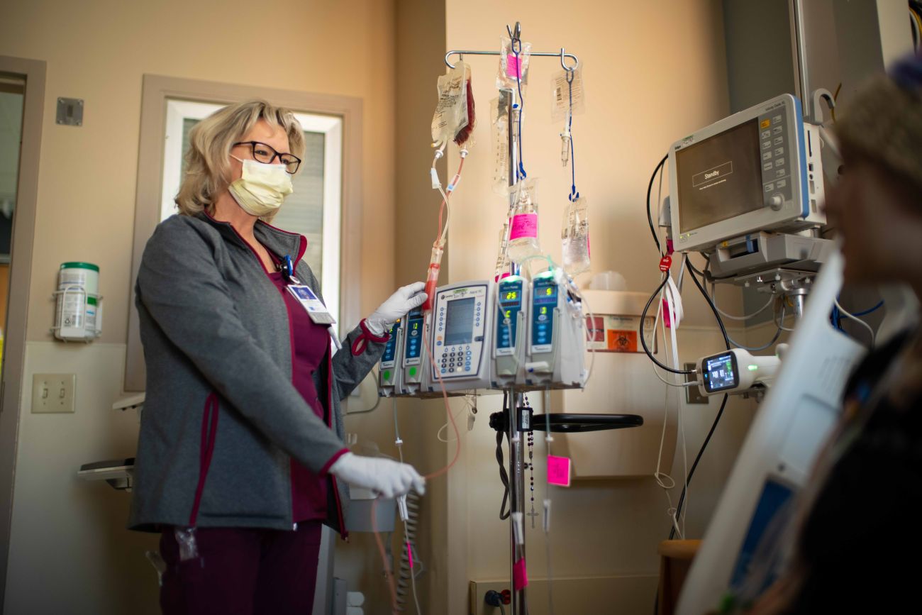 Nurse next to patient bedside