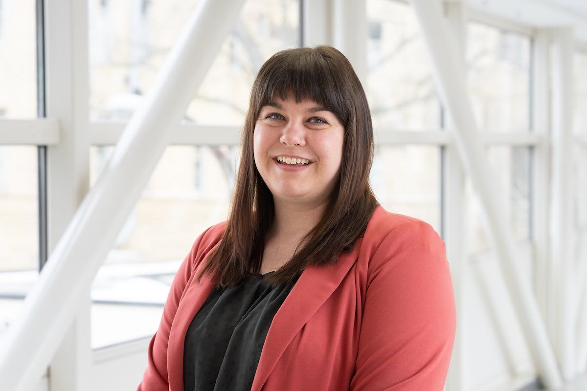 Doctor in blazer on bridge