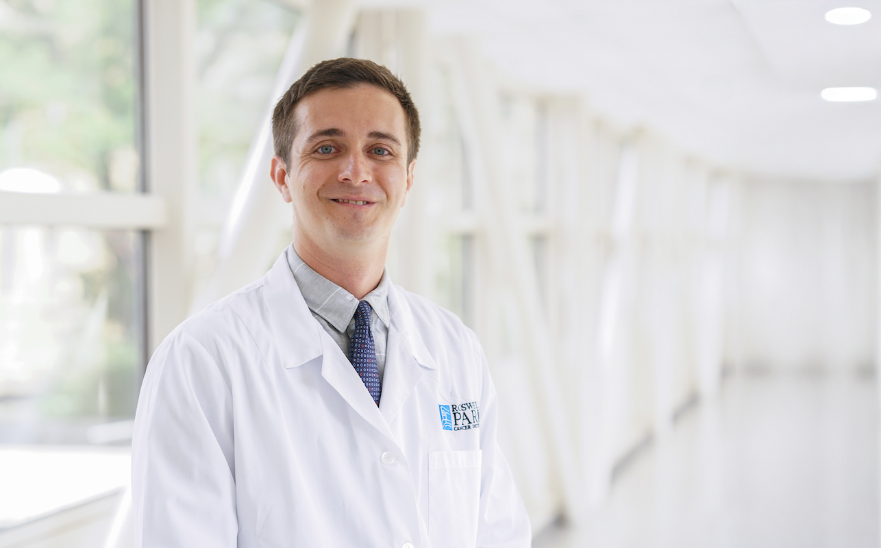 Dr. Lenoid Cherkassky headshot in a hallway at Roswell Park 
