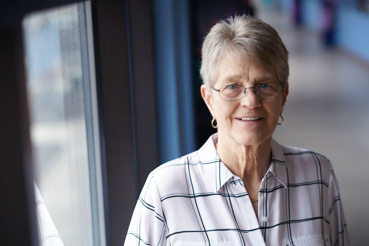 Senior Citizen Woman looks toward Camera