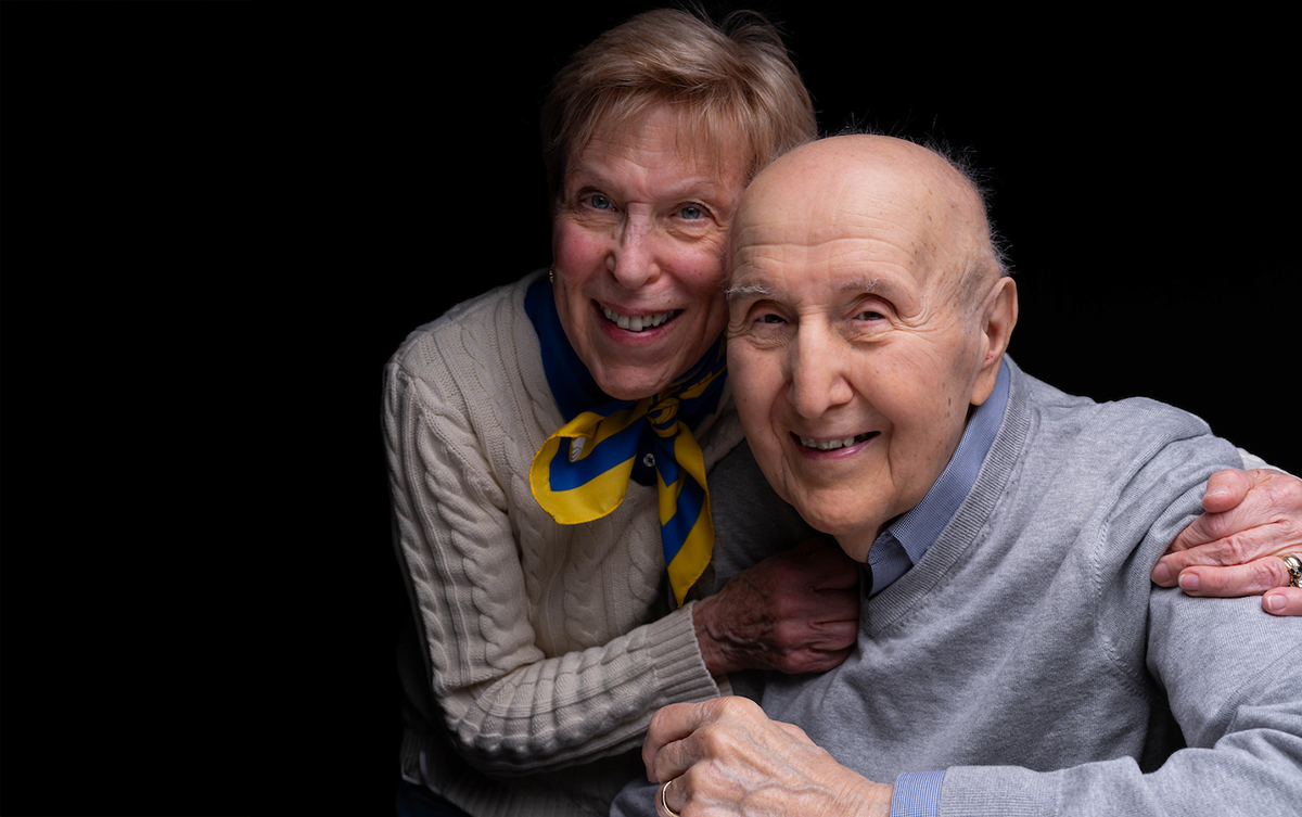 Breast cancer patient Joe Gadawski and his wife Nancy McGlen smile for the camera in the studio