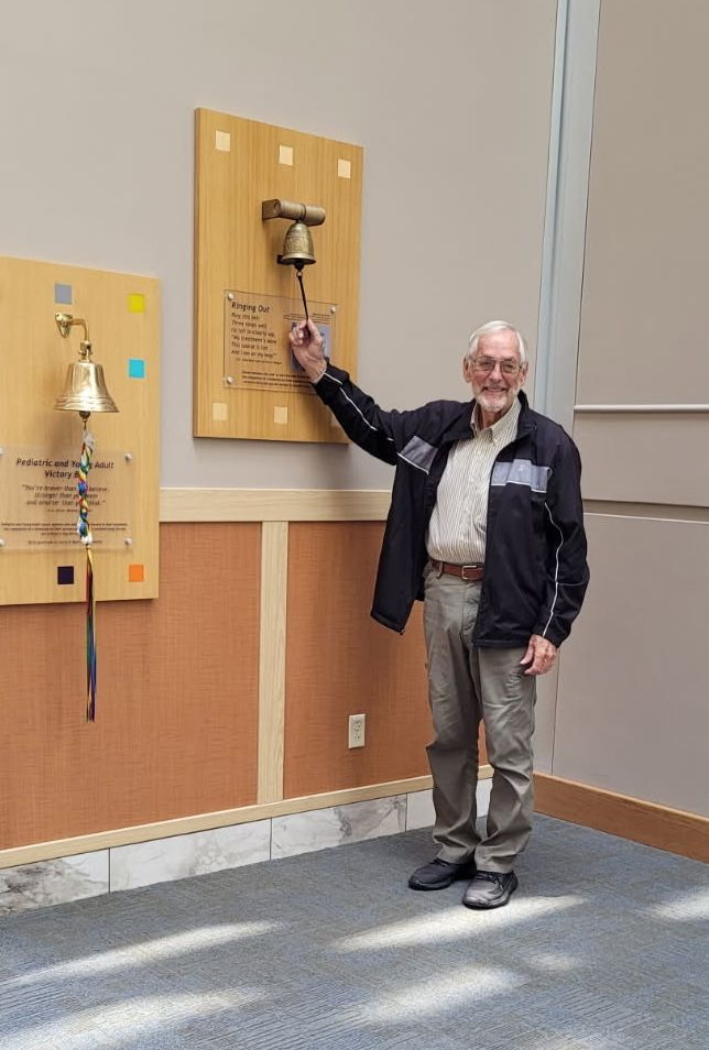 Esophageal patient Bill Strunk rings the Victory Bell