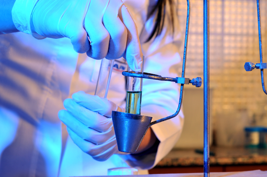 Medical professional working with a test tube