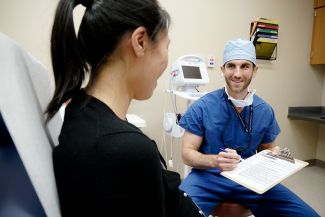 Dr. Bax with a patient