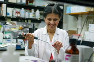 Dr. Yasmin Thanavala in lab