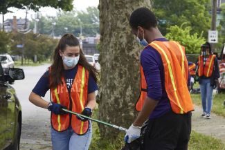 Students cleaning up local neighborhood 