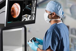 Physician using controller to drive monarch platform
