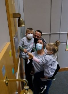 Kara Rowe rings the Victory Bell, October 2020