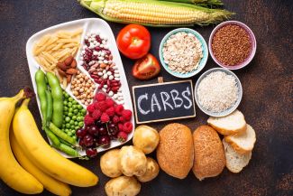 foods with a small sign that says carbohydrates