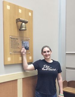 Heather ringing the Victory Bell