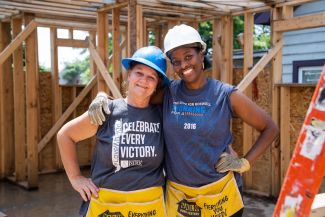 Roswell employees building homes