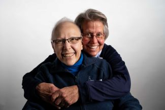 Cheryl Reinhardt poses with her Wife Barb