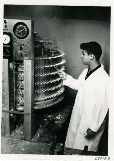 Scientist with an old smoking machine