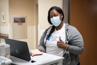 Nurse working on a computer