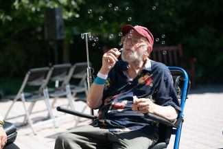 Stanley Dayan blowing bubbles