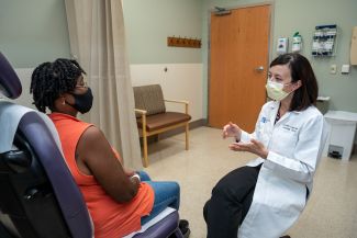 Dr. Katherine Lavigne-Mager clinic photos with patient - August 2022