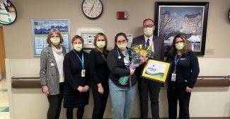 Nurse of the Month, Delaney Finewood, with nursing leadership