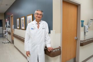 Dr. Benjamin Calvo poses for a photo in clinic