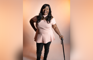 Aretha Graham poses for the Elevate Salon