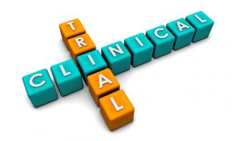Letters on blocks arranged to spell "clinical trial"